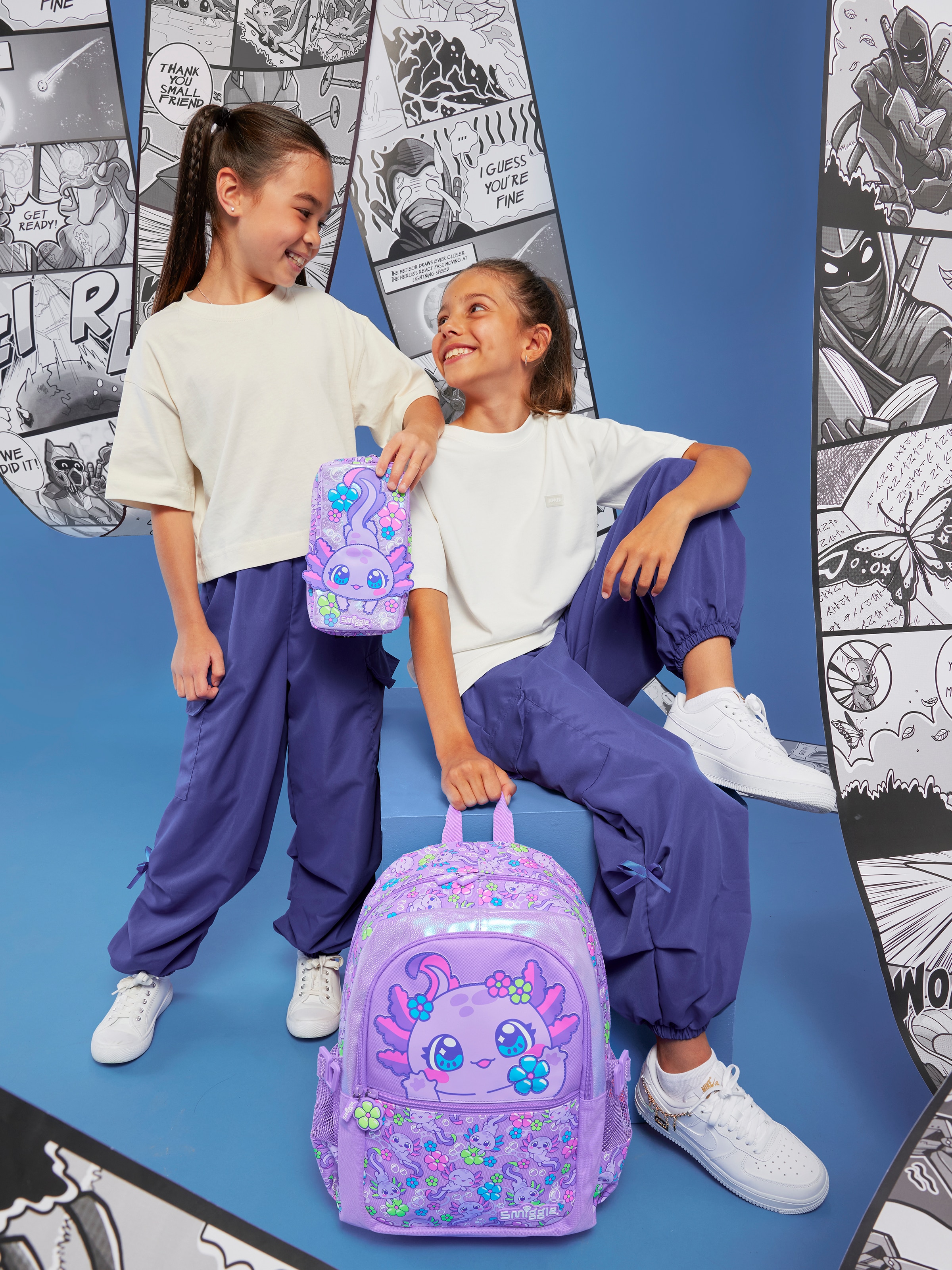 Boy with Dinosaur Backpack Hover